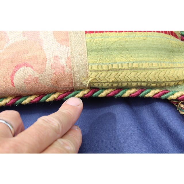 This is a Toscana patchwork pillow. The piece is from the late 20th century.