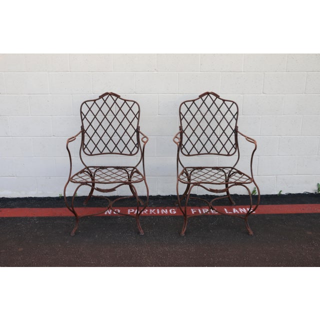 Exceptional vintage pair of outdoor dining armchairs attributed to Gregorius Pineo, Los Angeles. These sculptural patio...