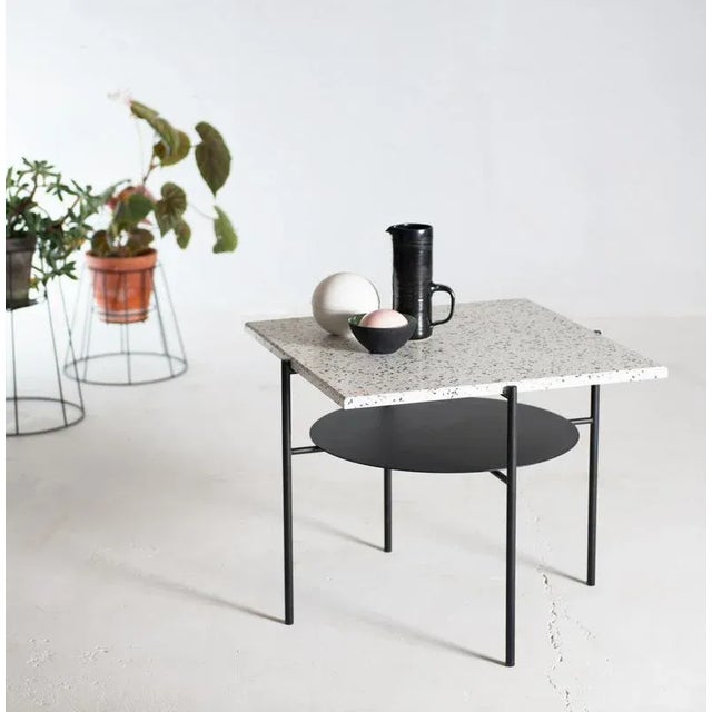 Confetti coffee table by ok design dimensions: d 63 x w 63 x h 51 cm. Materials: powder-coated metal, terrazzo. The...