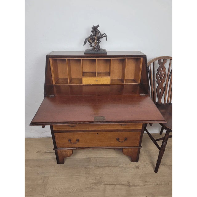 This is a gorgeous Edwardian inlaid Writing Bureau Desk displays many beautiful and timeless features that are sure to...