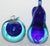 These hand made glass apple & pear bookends in fine condition. The deep blue & clear color. Pear is 6'high and the apple...