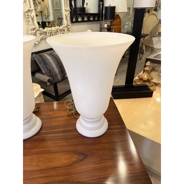 This is a pair of Vienne torchiere table lamps. These are in a frosted matte glass wired with one full size bulb. These...