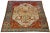 This hand-knotted wool Persian Serapi rug features a captivating medallion pattern on a beige field adorned with multiple...