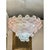 Romantic venetian Chandelier with clear and pink "manubri" elements in Murano glass. Exclusive texture "rigadin" that give...