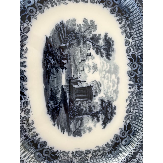These elegant Staffordshire platters feature the classic Grecian pattern with a finely detailed classical landscape center...