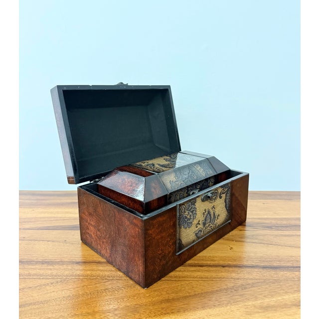 A handsome set of two vintage decorative keepsake boxes finished in a richly figured faux burl wood veneer with...