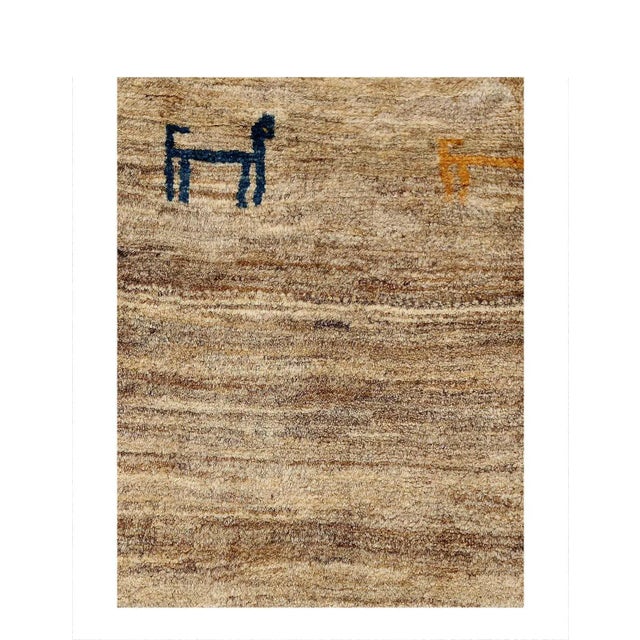 The word “Gabbeh” literally translates to “in the rough,” and it is an accurate description of this style of Persian rug....