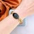 This striking bracelet is emblematic of the Egyptian Revival aesthetic. It dates from c.1920. Condition Report: Very Good...