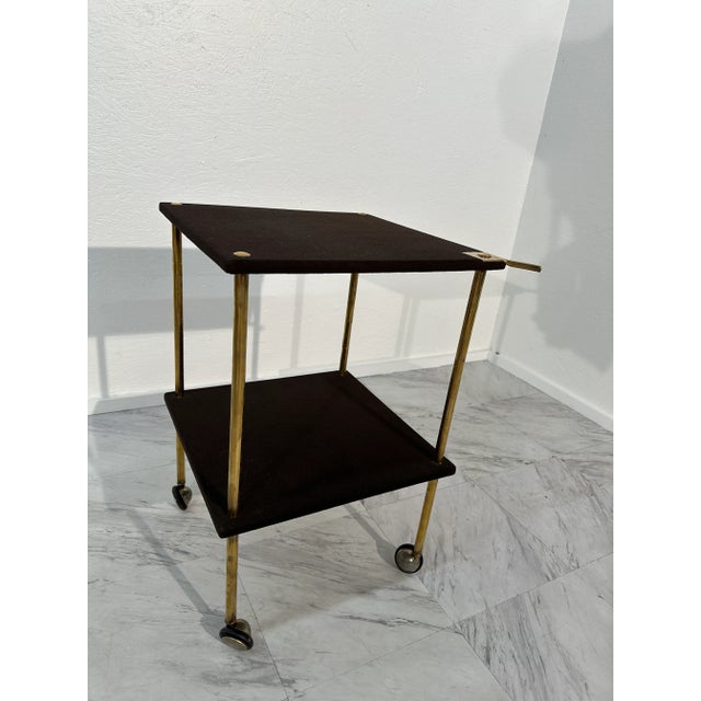 Embark on a journey through mid-century Italian design with the Vintage Trolley on Wheels T9 by Luigi Caccia Dominioni for...