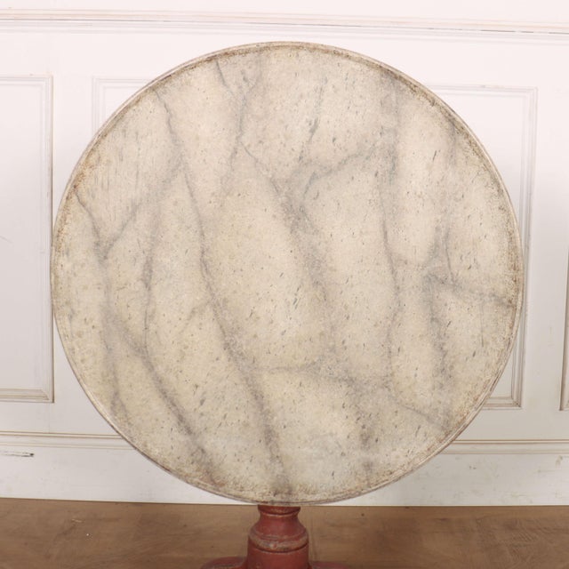 18th century English painted oak tripod table with a faux marble top. 1780. This piece is designed in the style of the...