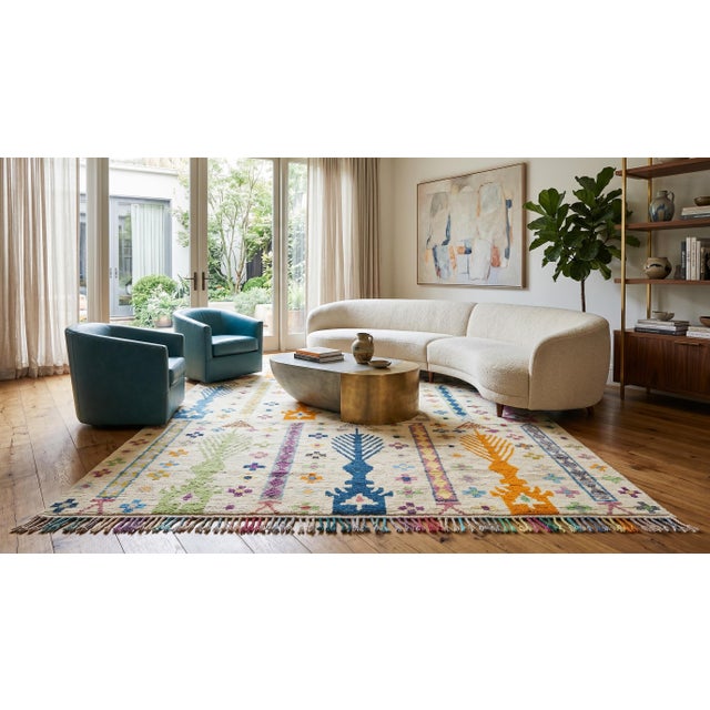 Elevate your space with this stunning Modern Moroccan-style rug, a vibrant blend of traditional Berber craftsmanship and...