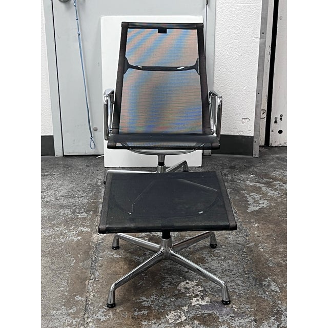 Design Plus Gallery presents a Vintage Eames Aluminium Group Mesh Lounge Chair + Ottoman Set by Charles and Ray Eames from...