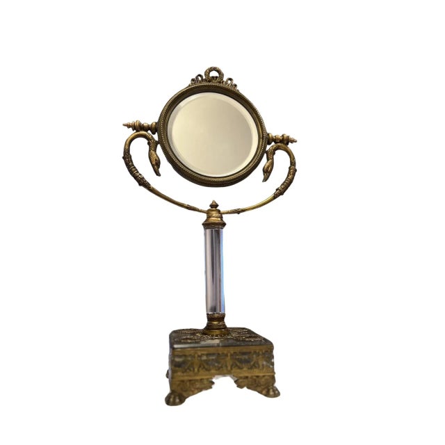 French, early to mid 19th century. A stunning French Neoclassical vanity mirror. Atop the beautiful beveled glass (double...