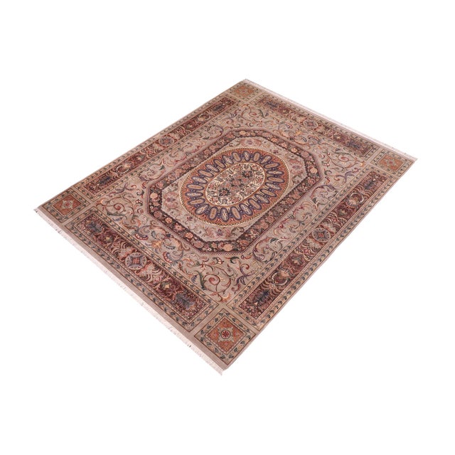 Designed with mesmerizing intricacy and gorgeous color palette, this hand-knotted masterpiece demonstrates the beauty and...