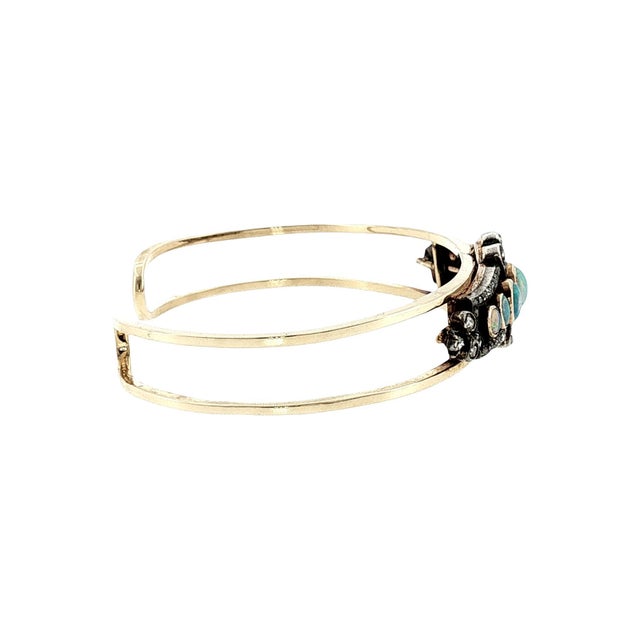 A Victorian silver-over-gold pin from the mid-19th century repurposed as a cuff bracelet. Crafted with 14k gold and...