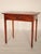 George III mahogany writing table, early 19th century. With a two board top with thumb molded front and side edges, a...
