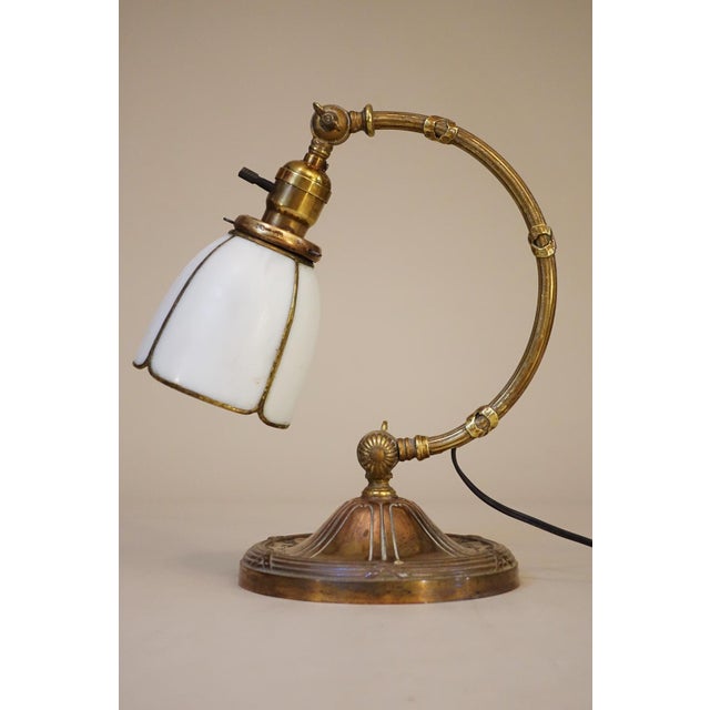 A rare, brilliant and exceptional early Industrial Machine Age Brass Art Nouveau double articulating desk table lamp...