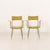 This set of two italian armchairs from the 1950s was most likely designed by carlo de carli. It is a refined example of...
