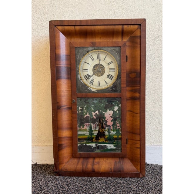 This listing is for an antique ogee clock by Seth Thomas. It has a nice wooden case. Appears to be maple. It has a unique...