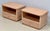 A handsome pair of French oak and woven cane nightstands by Maugrion for Roche Bobois, circa 1980. Each nightstand...