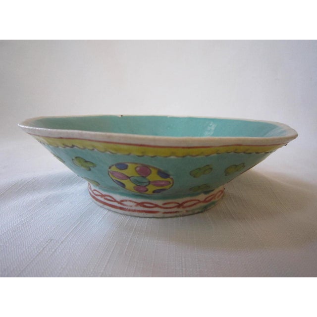 Turquoise glazed Famille Rose bowl. Interesting design. Bowl is in excellent condition with chips, cracks or damage. It...