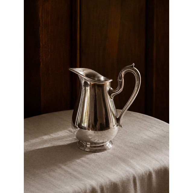 A beautifully proportioned Reed & Barton silver plate creamer/small pitcher in the classic Jamestown pattern, model #1803...