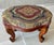 Excellent Pre-Owned Condition. This beauty is reminiscent of a type of upholstered footstool that was all the rage in the...