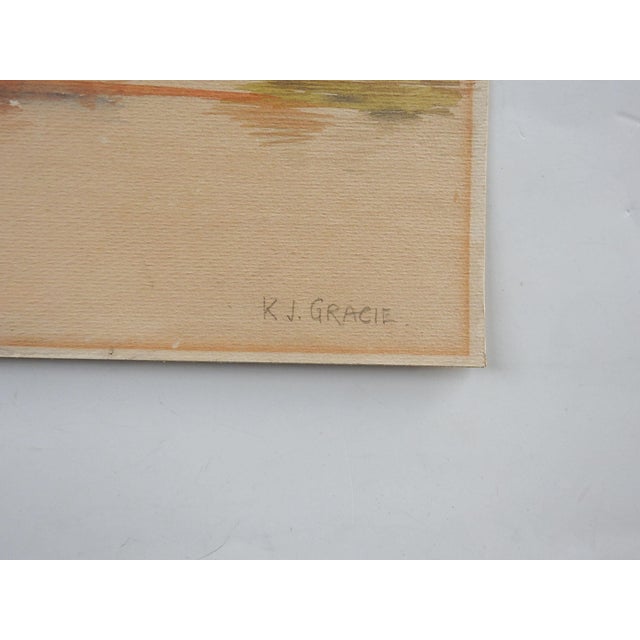 Early 20th century watercolor on artist board lakeside landscape painting. Signed K. J. Gracie lower right corner....
