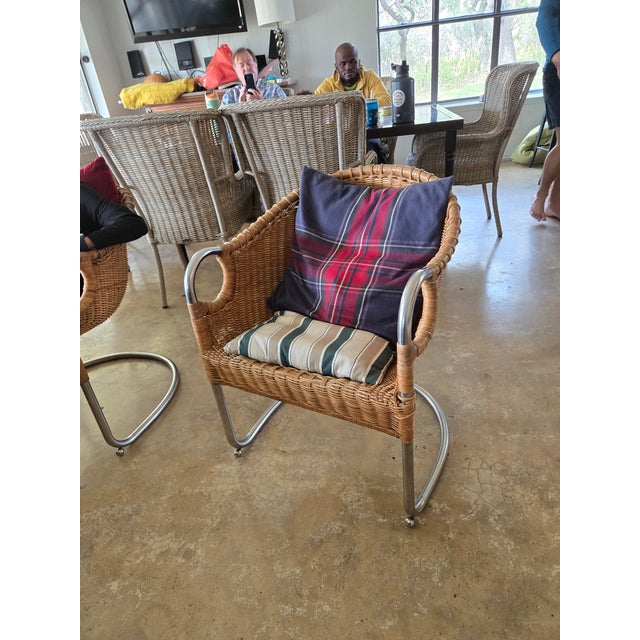 Vintage chrome and wicker chairs..needs minor repairs on wicker..very sturdy and still in great shape..lovely accent...
