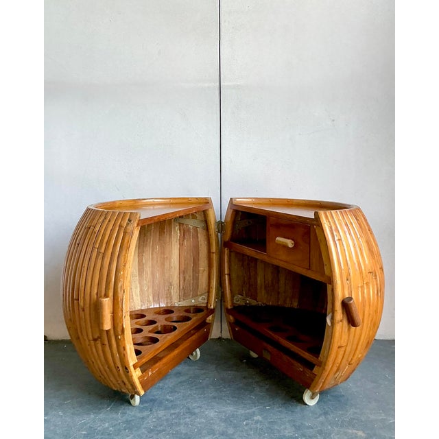 Elevate your entertaining with this charming vintage Boho Chic dry bar, a testament to the relaxed yet sophisticated...