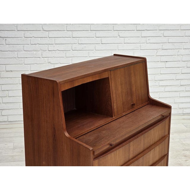 1970s, Danish chest of drawers with a folding mirror. Teak wood and mirror inside. Original very good condition: no...