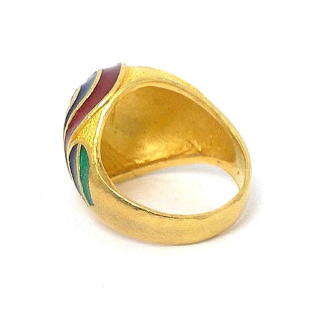 This authentic vintage dome ring is crafted from solid 24k gold with a textured surface. The high rounded top features a...