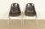 An iconic pair of Eames "DSS" shell side chairs, dining chairs, or office chairs By Charles & Ray Eames for Herman Miller...