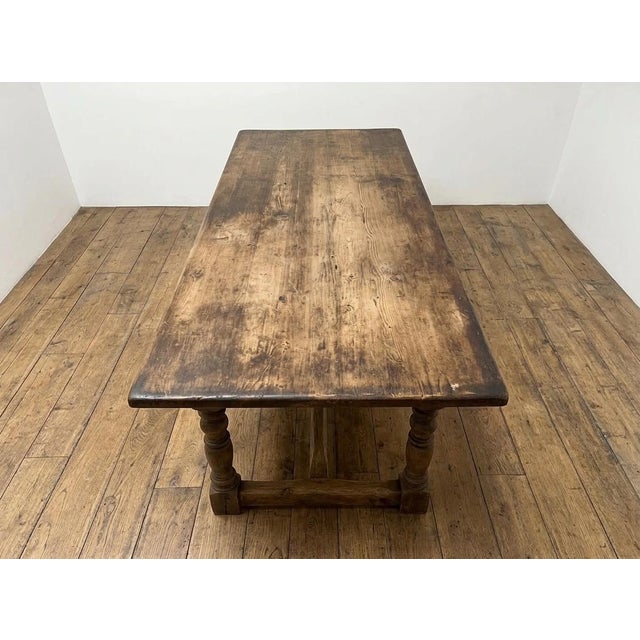 Large French Monastery Dining Table in Pitch Pine, 1870s, in Very Good conditions. Designed before 1890 This piece has an...