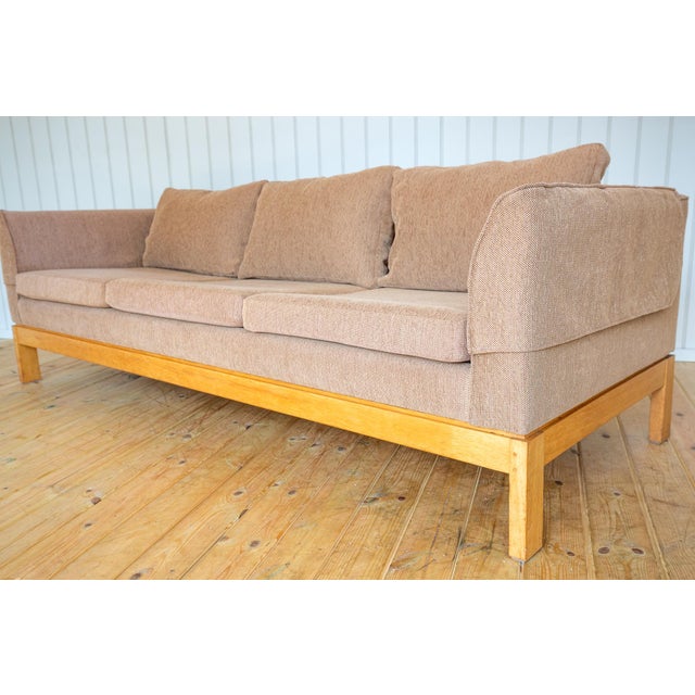 A very attractive and rare, solid maple-framed 1970s lounge set in lovely vintage condition. Attributed to world-renowned...