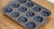 Own a beautiful piece of early American kitchen history with this antique 12-cup “Turk’s Head” cast iron gem pan. Dating...