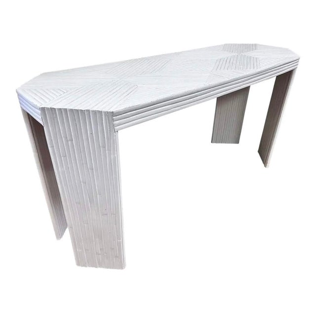 Mid century split bamboo console table. Individual bamboo pieces diagonally applied in sections at the tabletop creating a...