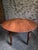 Antique French drop-leaf dining table dating from the late 19th century, circa 1870–1900. The table has a cherrywood top...