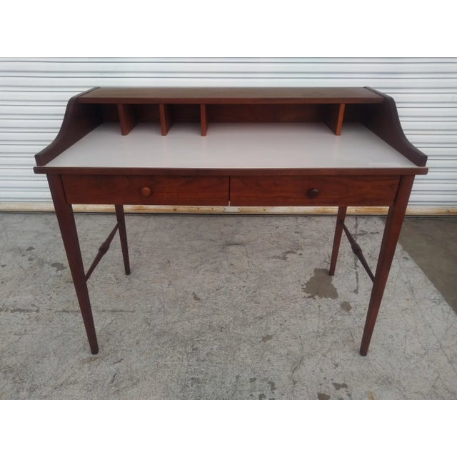 This is a stunning MCM desk by Drexel. It.comes from it's Biscayne line of furniture. It's made of a richly grained...