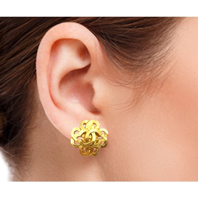 Chanel Vintage Gold Plated CC Twisted Flower Clip on Earrings * Marked 97 * Made in France -It is approximately 0.9" x 1"...