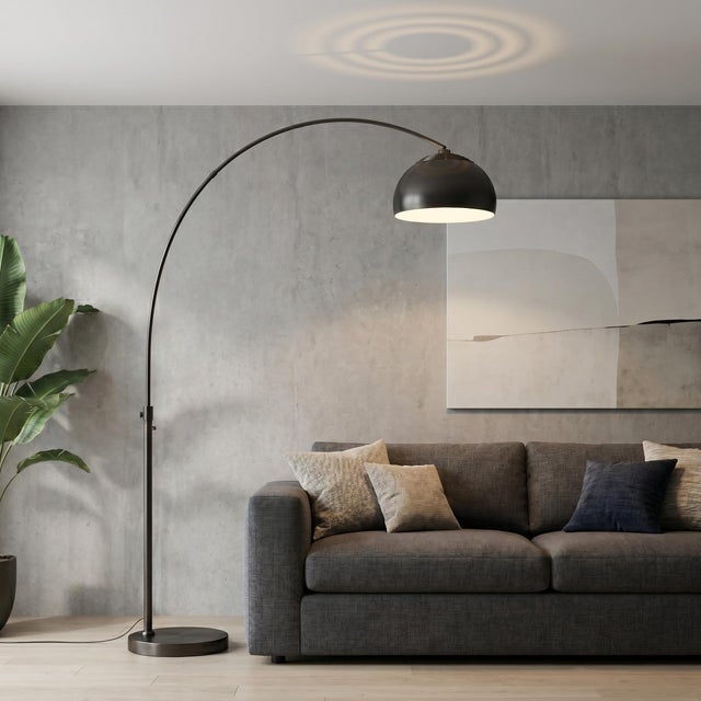 Featuring a sweeping, gracefully arched silhouette, the Half Dome Arc Lamp by Peter Morelli is a modern masterpiece...