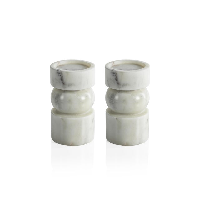 This set of pillar candle holders will bring a touch of elegance to any room. Crafted from white marble, these candle...