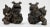 A substantial, heavy stone pair of partnered Foo Dog statues with a deep bronzed finish. Wonderful on a mantle or as...