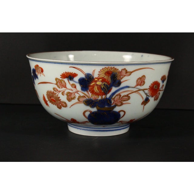 An outstanding early Arita fine porcelain bowl Exquisitely decorated in Imari style with the typical palette: iron red,...