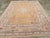 An antique Turkish Oushak room size carpet handmade during the Early 20th century. Measures: 8' 5" x 11' 7"