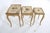 Mid 20th century set of (3) painted nesting tables with carved and painted wood. These are labeled, Kozak Studios, which...