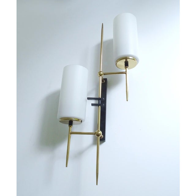 Exceptional pair of very large french, architectonic sconces by lunel, paris, circa 1965, asymetric brass stucture with...