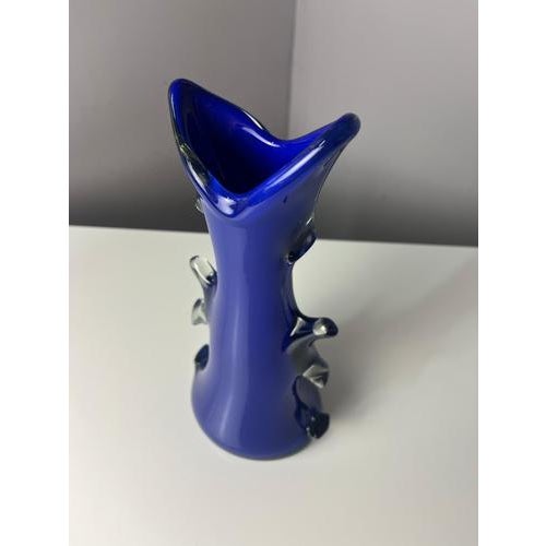 This striking vase, designed by the HSG Tarnowiec glassworks in Poland, is aptly nicknamed Shark Fin. The design is...