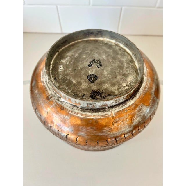 This middle eastern style bowl has it all- texture, design, function and character. The two-tone mix of silver and copper...