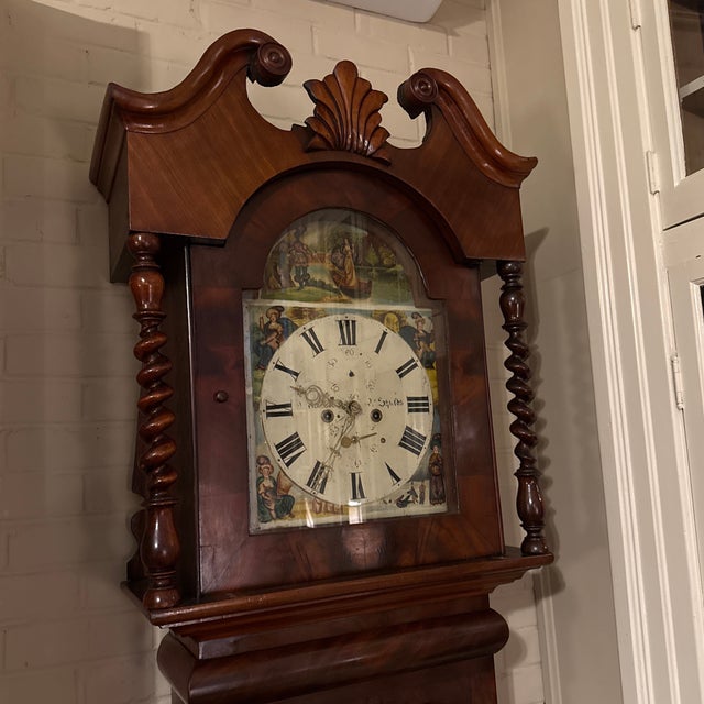 A superb 1840s eight day tall case Clock by William Rennison of North shields. Mahogany and flame mahogany case with...